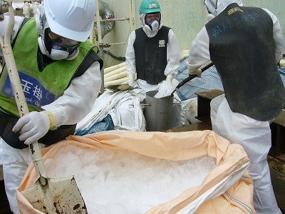 TEPCO workers try to stop the nuclear party, but there ain't enough ice in the world unless someone clicks and drags Japan to the Arctic Circle.